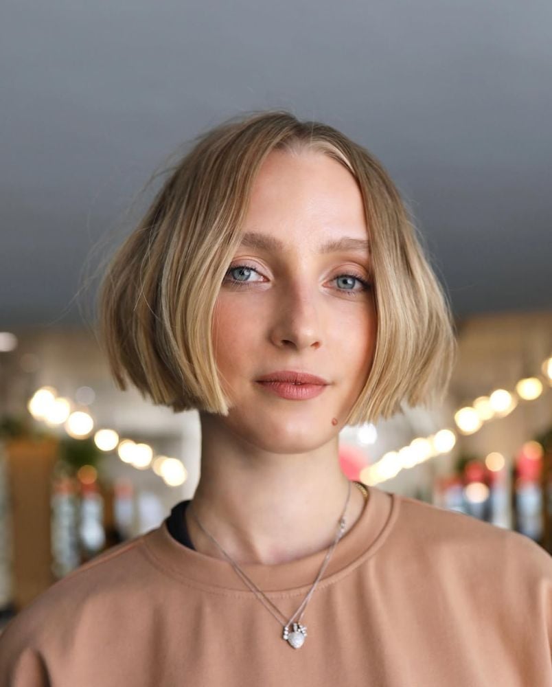 Ear Length Ash Blonde Bob With Giving A Clean And Polished Appearance — Simple Blunt Bob