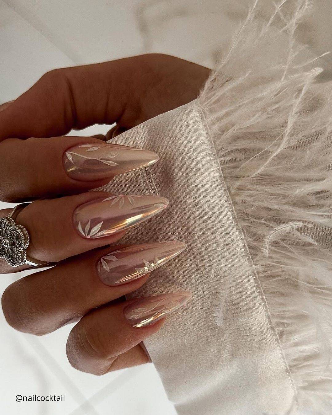 Long Almond Chrome with White Leaf Design Long Almond Chrome with White Leaf Design — Simple Champagne Nails