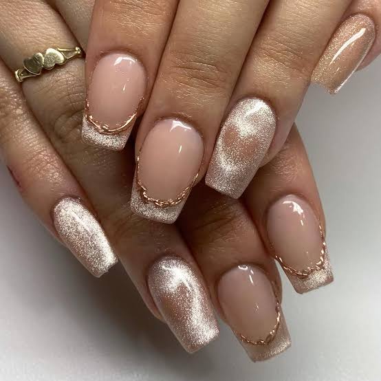 Shimmering Champagne Silver French Tip Almond Nails, Close-Up Take Shimmering Champagne Silver French Tip Almond Nails, Close-Up Take — Simple Champagne Nails