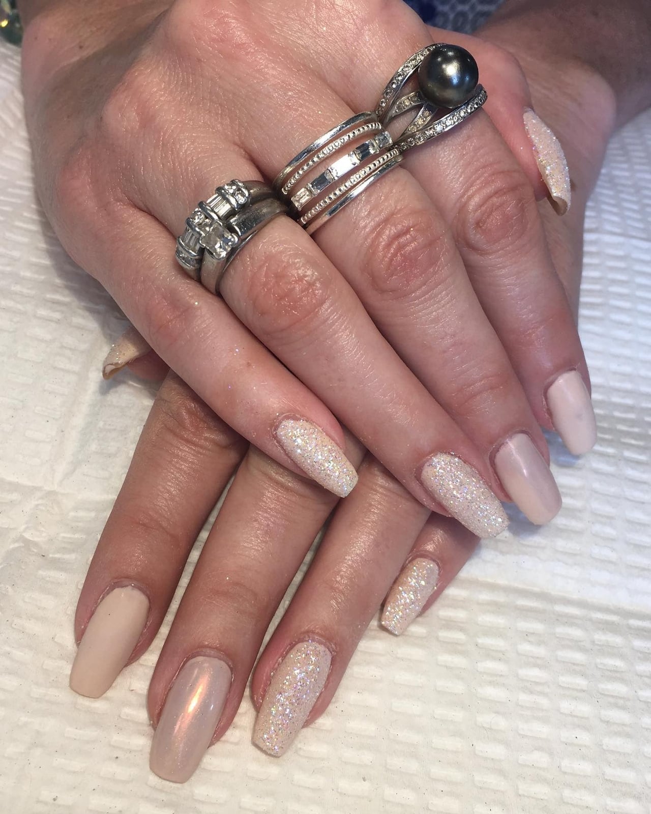 Long Stiletto Nude Nails with Celestial Charms Long Stiletto Nude Nails with Celestial Charms — Simple Champagne Nails