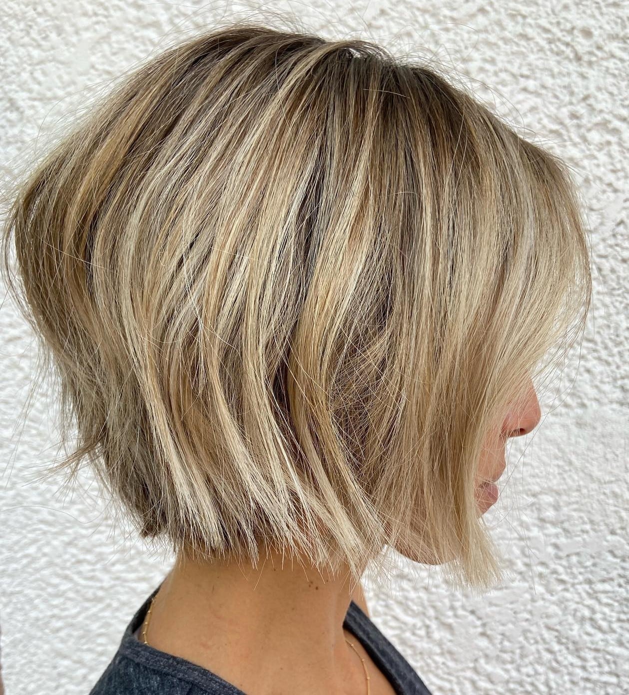 Ash Blonde Bob With Textured Layers Ash Blonde Bob With Textured Layers — Simple Chin Length Bob