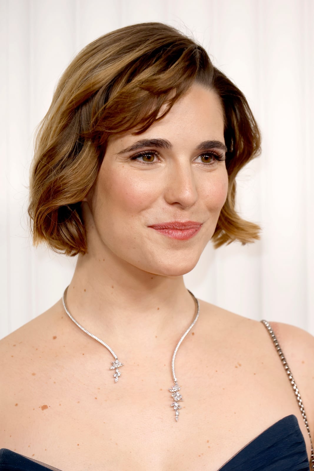 Voluminous Brunette Bob With Curled Ends Voluminous Brunette Bob With Curled Ends — Simple Chin Length Bob