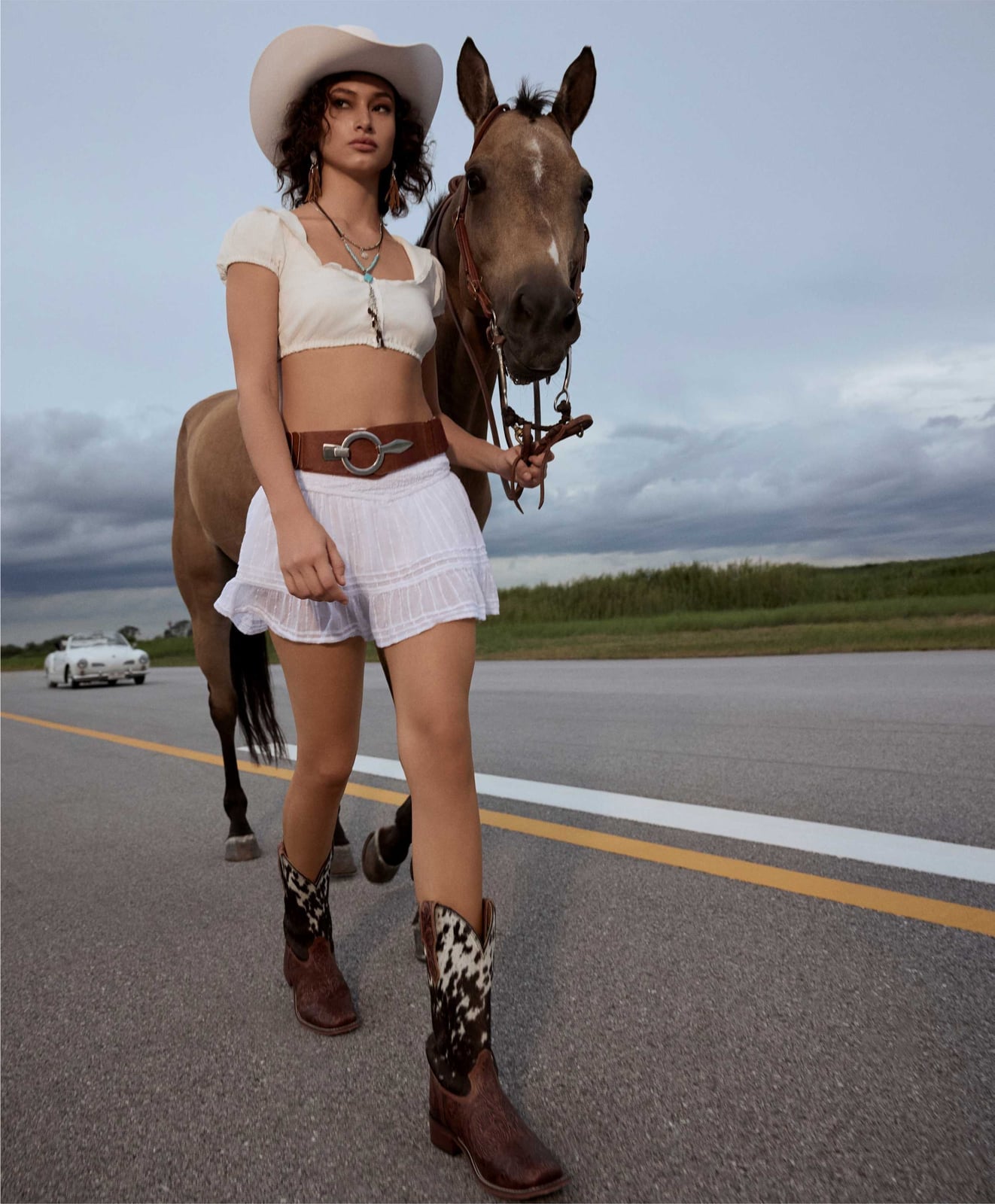 Crop Top and Eyelet Mini Skirt with Cow Print Boots and Cowboy Hat Crop Top and Eyelet Mini Skirt with Cow Print Boots and Cowboy Hat — Simple Cowboy Hat Outfits