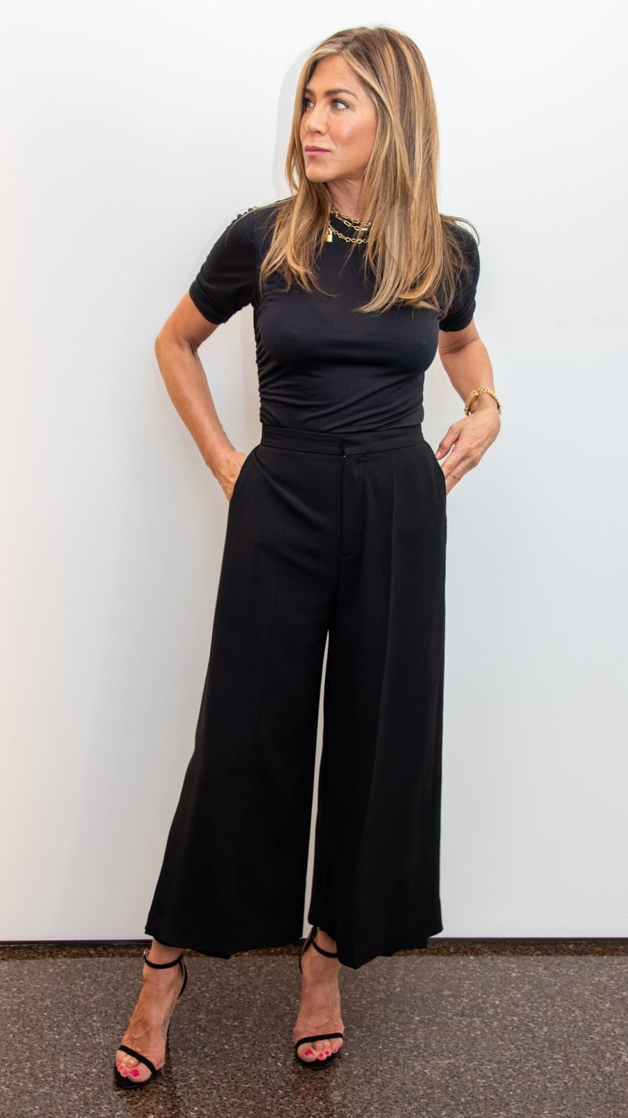 Black Culottes With A Black T-Shirt And Gold Jewelry — Simple Culottes Outfits