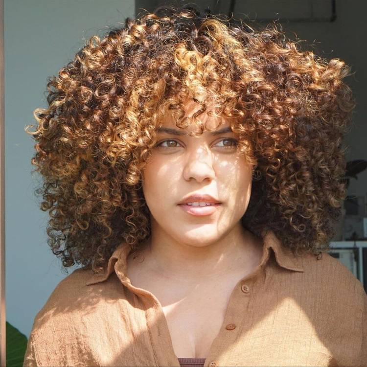Shoulder Length Curls With Caramel Highlights — Simple Curly Bangs