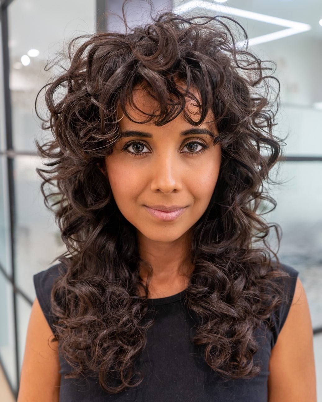 Shoulder Length Layered Shag With Curly Bangs — Simple Curly Bangs