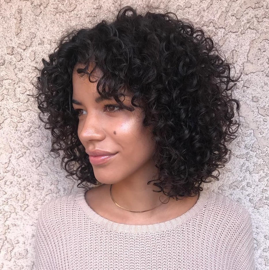 Collarbone Bob With Blonde Highlights and Bouncy Curls — Simple Curly Bob Hairstyles
