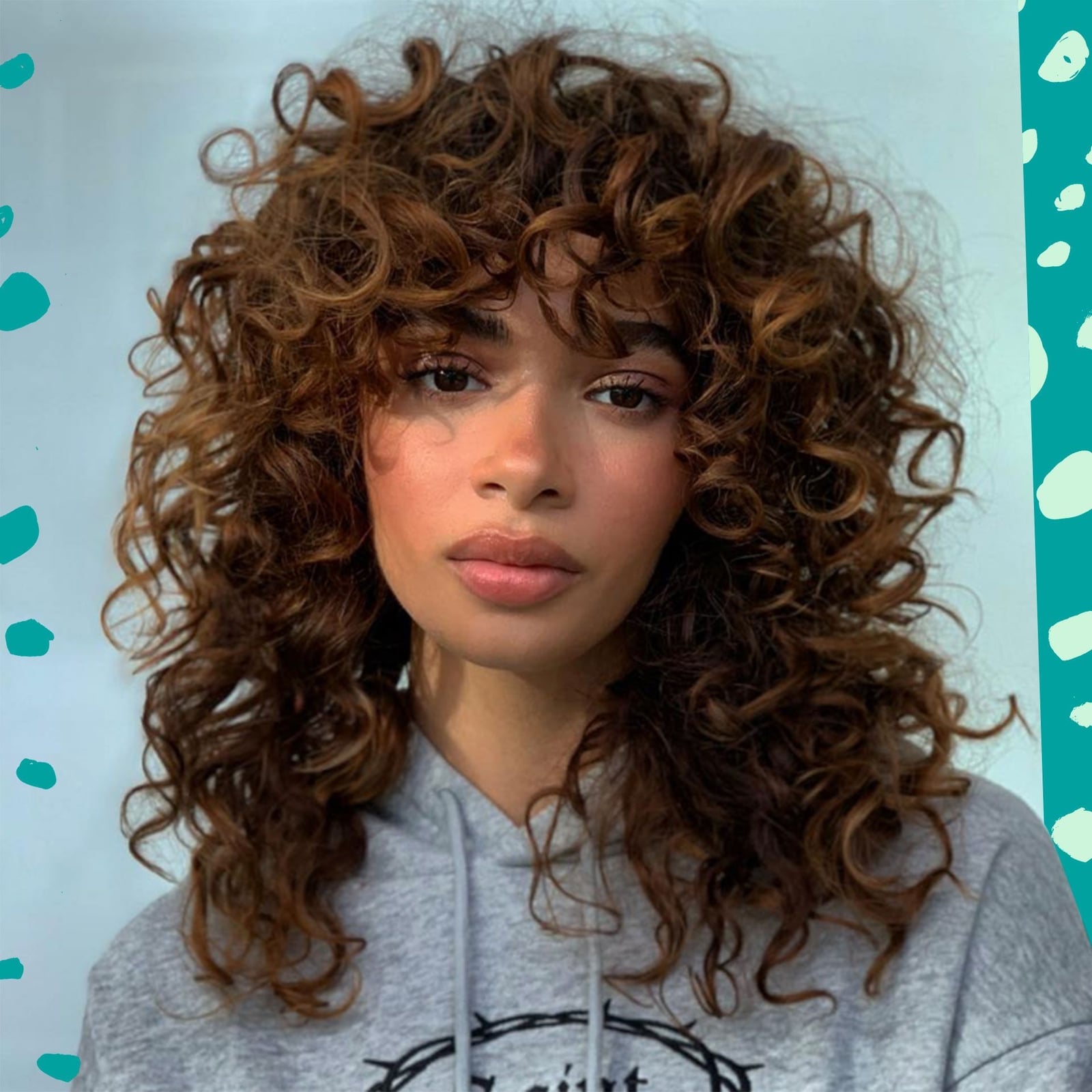 Mid-Back Shag With Full Fringe and Caramel Highlights Mid-Back Shag With Full Fringe and Caramel Highlights — Simple Curly Shag
