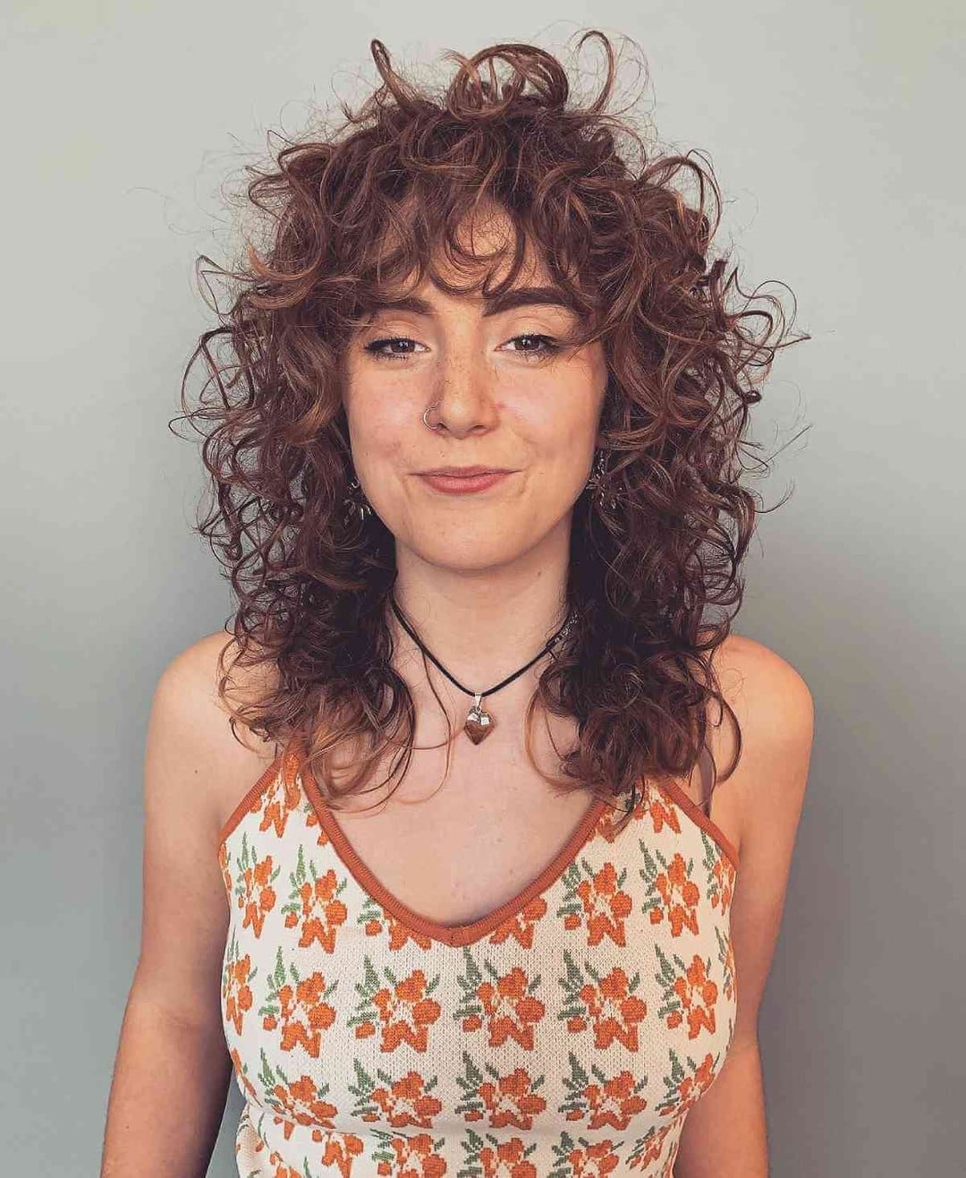 Collarbone Shag With Curtain Bangs and Ash Blonde Highlights Collarbone Shag With Curtain Bangs and Ash Blonde Highlights — Simple Curly Shag