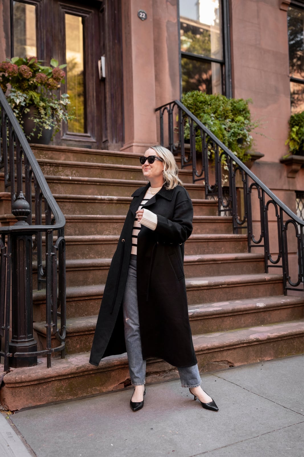 Long Black Coat Over Striped Sweater and Jeans Long Black Coat Over Striped Sweater and Jeans — Simple Dinner Outfits Night