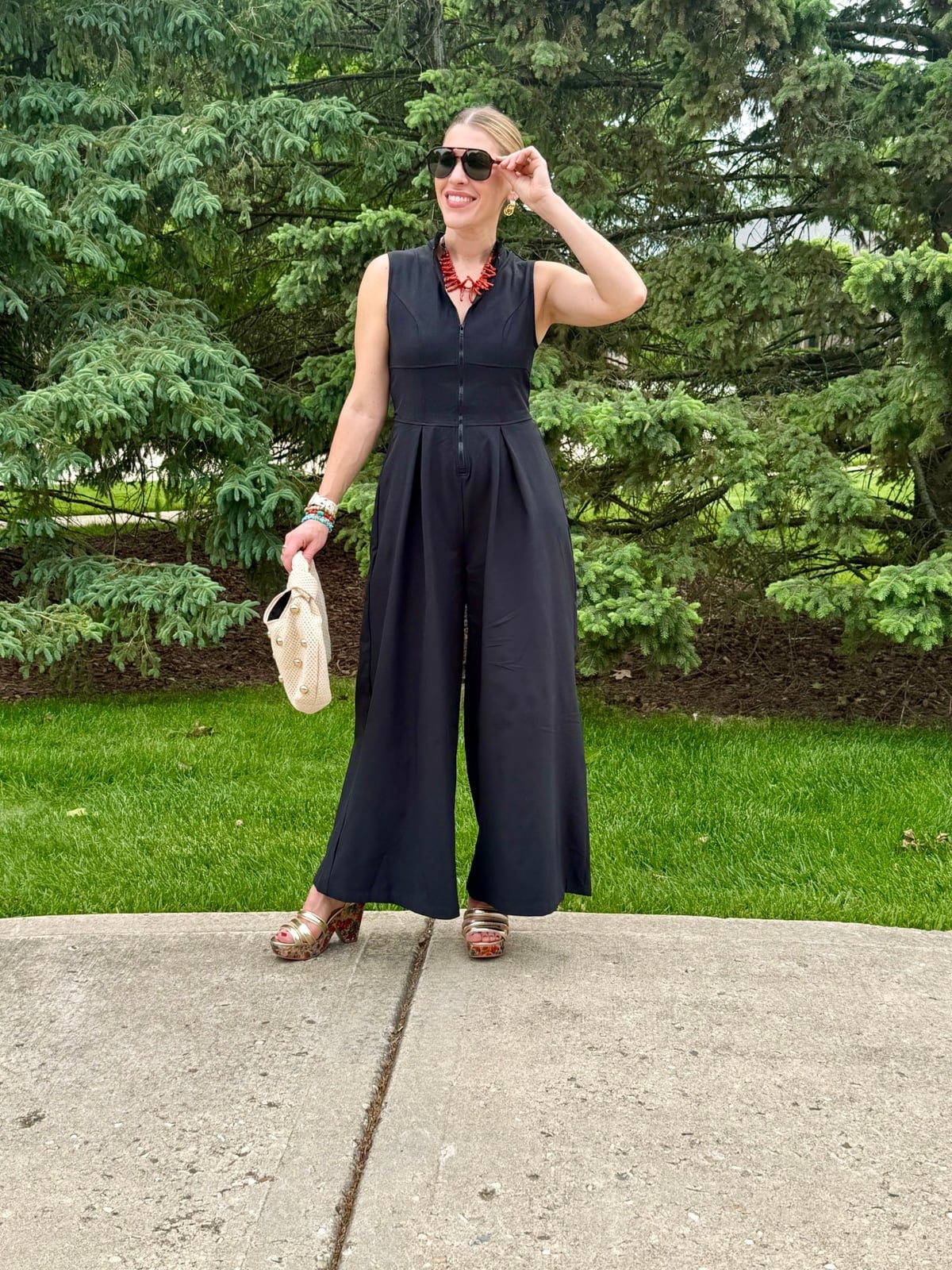 Black Sleeveless Jumpsuit with Wide Legs Black Sleeveless Jumpsuit with Wide Legs — Simple Dinner Outfits Night