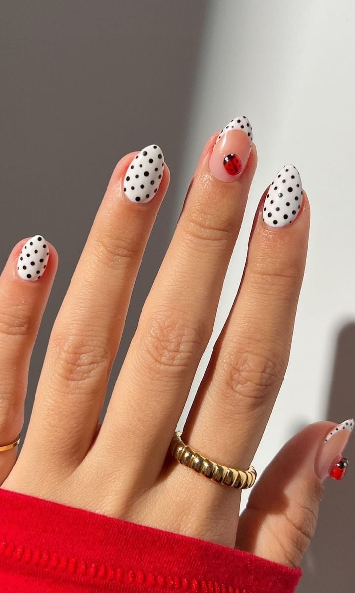 Medium Oval White With Black Dots And Ladybug Accent Medium Oval White With Black Dots And Ladybug Accent — Simple Dots Nail Designs