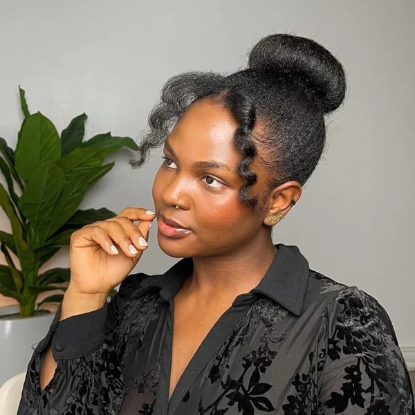 Long Black Sleek Bun With Coily Face-Framing Curls Long Black Sleek Bun With Coily Face-Framing Curls — Simple Extensions Hairstyles