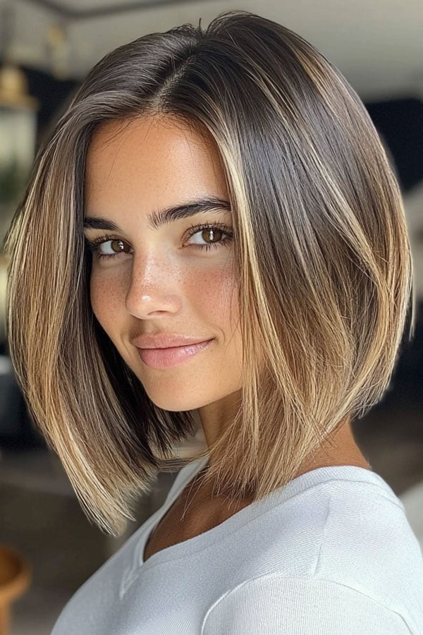 Chin Length Angled Bob With Subtle Highlights Chin Length Angled Bob With Subtle Highlights — Simple Face Framing Highlights