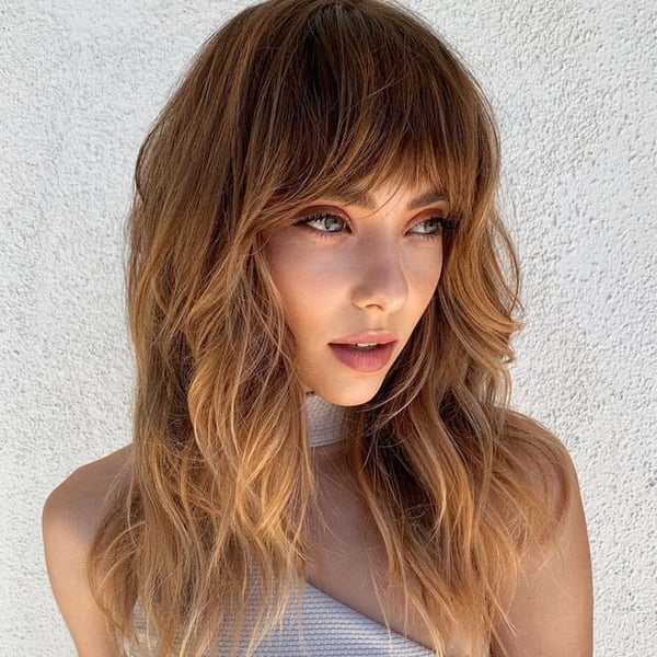 Shoulder Length Shag With Curtain Bangs Shoulder Length Shag With Curtain Bangs — Simple Face Framing Highlights