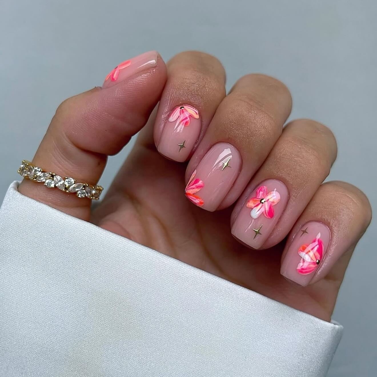 Short Square Nude Nails with Vibrant Floral Accents Short Square Nude Nails with Vibrant Floral Accents — Simple Floral Nails