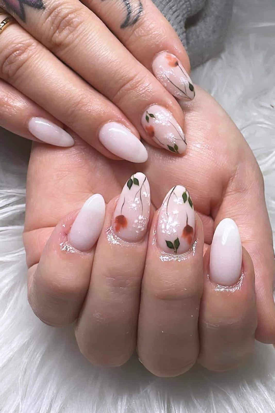Sheer Nude Almond Nails with Delicate Floral Motifs Sheer Nude Almond Nails with Delicate Floral Motifs — Simple Floral Nails
