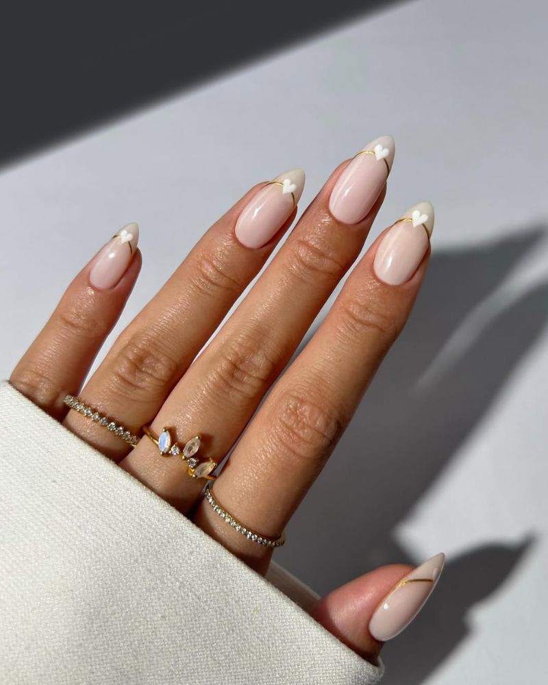 Medium Almond White Heart French Tips With Gold Line Medium Almond White Heart French Tips With Gold Line — Simple French Tip Nails