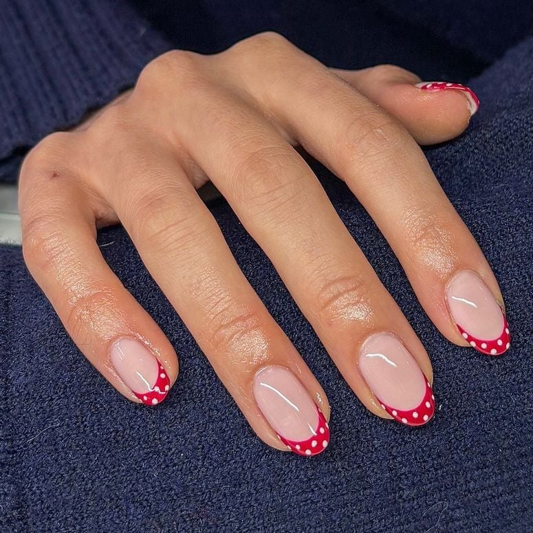 Medium Oval Red French Tips With White Polka Dots Medium Oval Red French Tips With White Polka Dots — Simple French Tip Nails