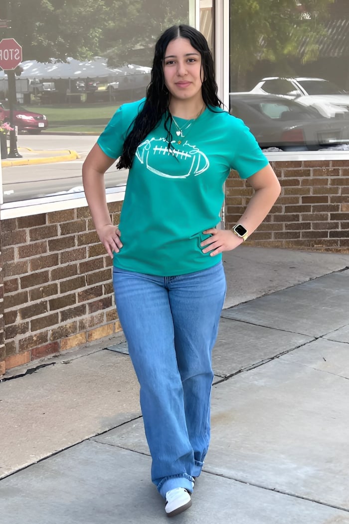 Teal Football Graphic Tee with Blue Wide-Leg Jeans Teal Football Graphic Tee with Blue Wide-Leg Jeans — Simple Game Day Outfits