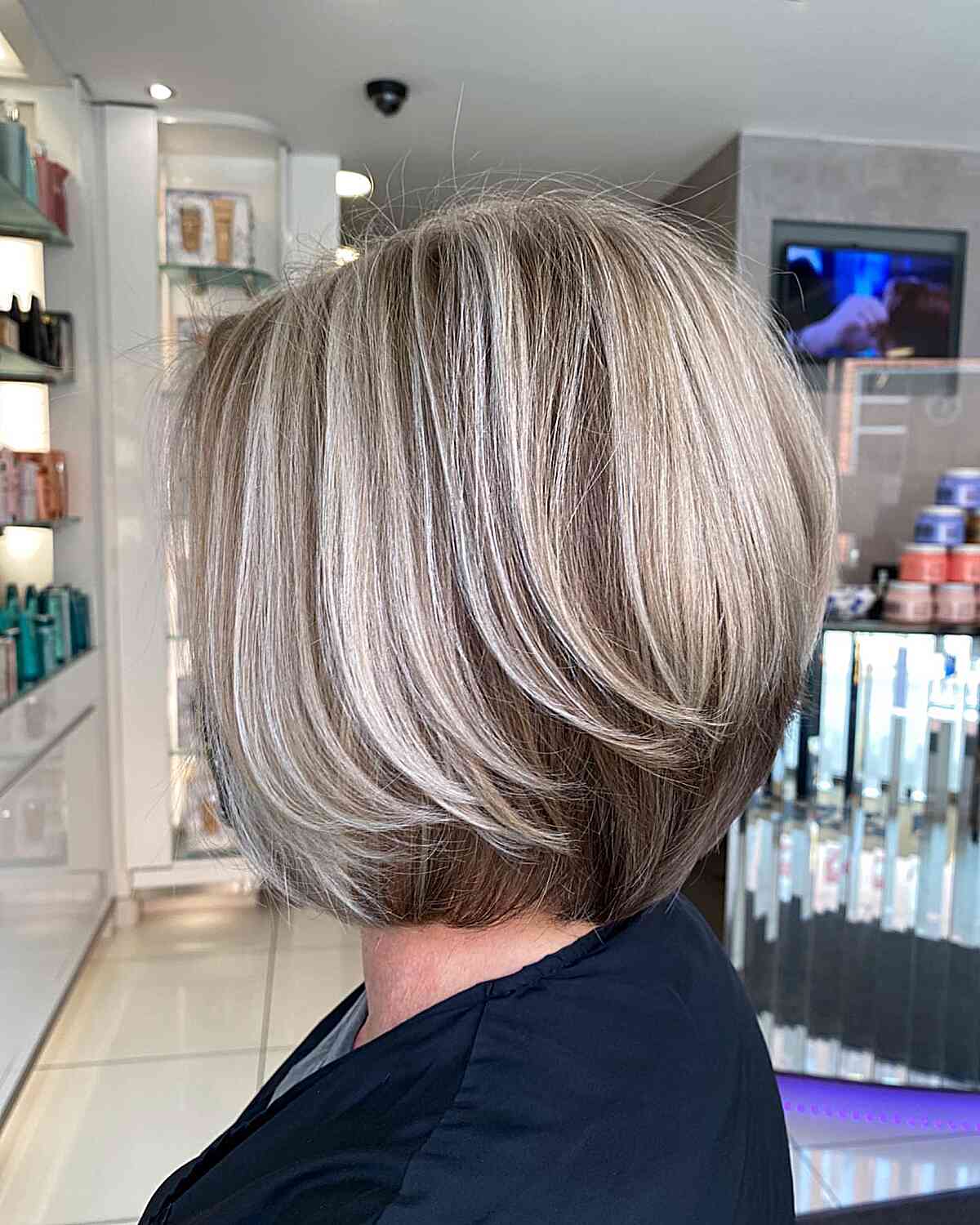 Layered Gray Bob With Blonde Highlights — Simple Gray Blending