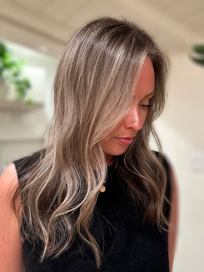 Mid-Back Wavy Hair With Curtain Bangs — Simple Gray Blending
