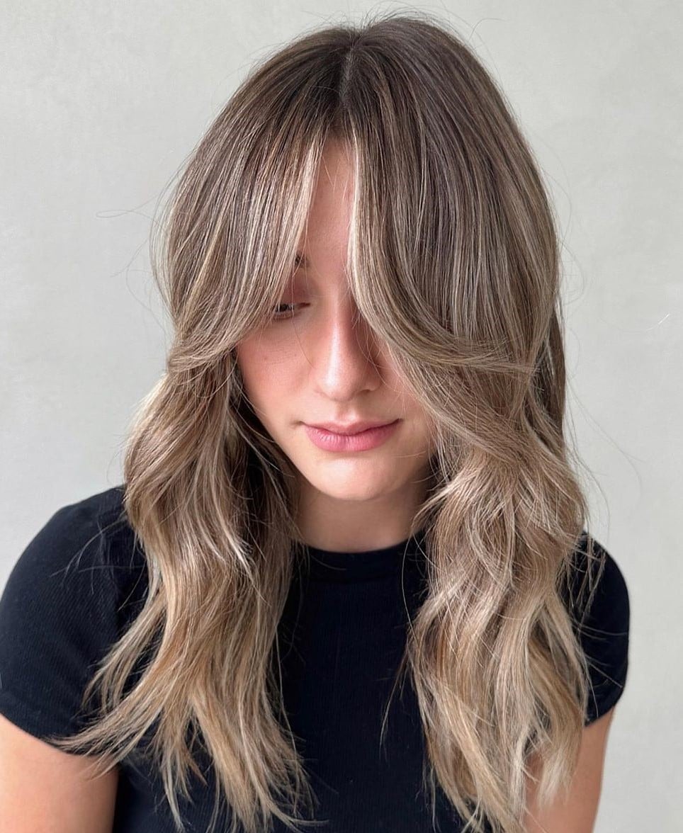 Mid-Back Bronde Balayage With Curtain Bangs — Simple Hair Color for Pale Skin