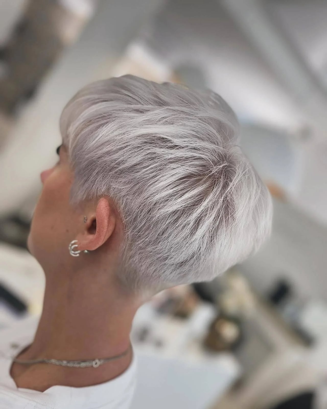 Platinum Pixie With Forward Swept Layers Platinum Pixie With Forward Swept Layers — Simple Haircuts for Thinning Hair