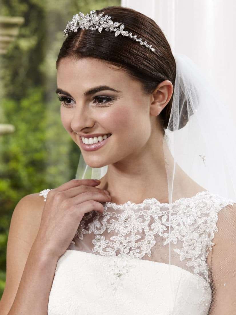 Neat Low Bun With Tiara And Veil — Simple Hairstyles with Veil