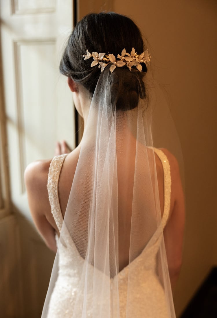 Neat Low Bun With Floral Hairpiece — Simple Hairstyles with Veil
