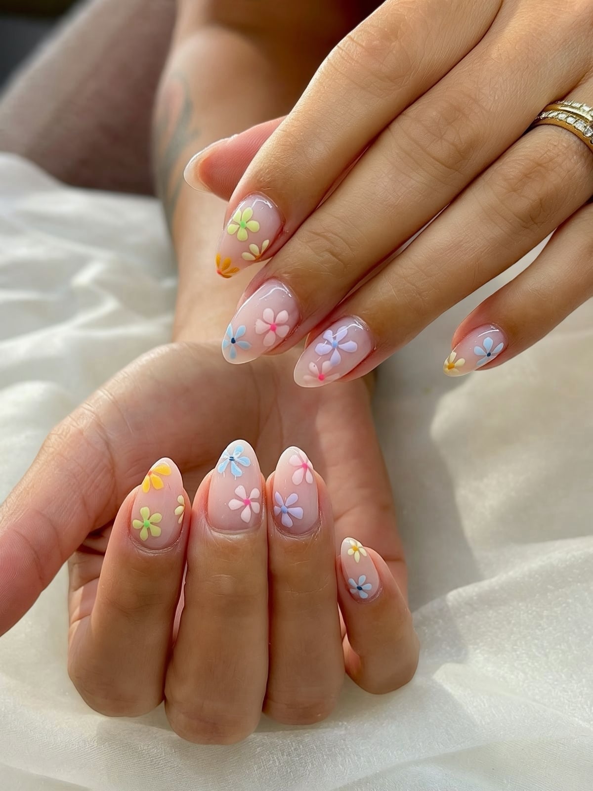 Short Almond Nude Nails with Pastel Floral Motifs Short Almond Nude Nails with Pastel Floral Motifs — Simple Japan Nails