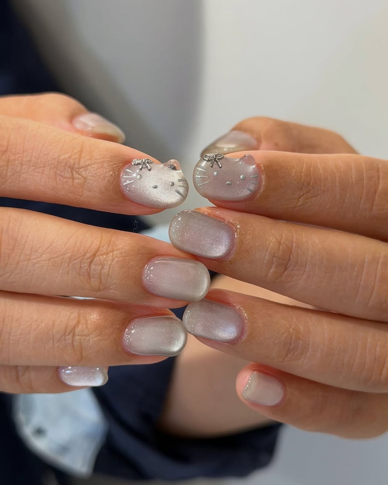 Short Almond Milky White Nails with Hello Kitty Design Short Almond Milky White Nails with Hello Kitty Design — Simple Japan Nails