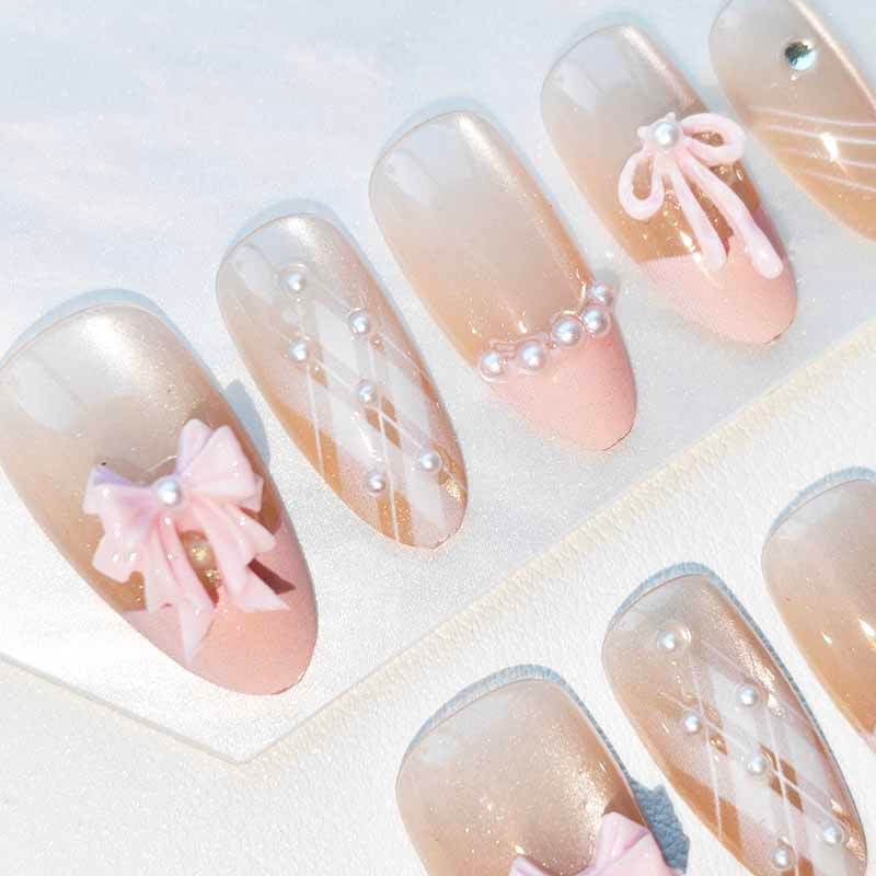 Medium Almond Nails With 3D Pink Bows And Pearls Medium Almond Nails With 3D Pink Bows And Pearls — Simple Kawaii Nails