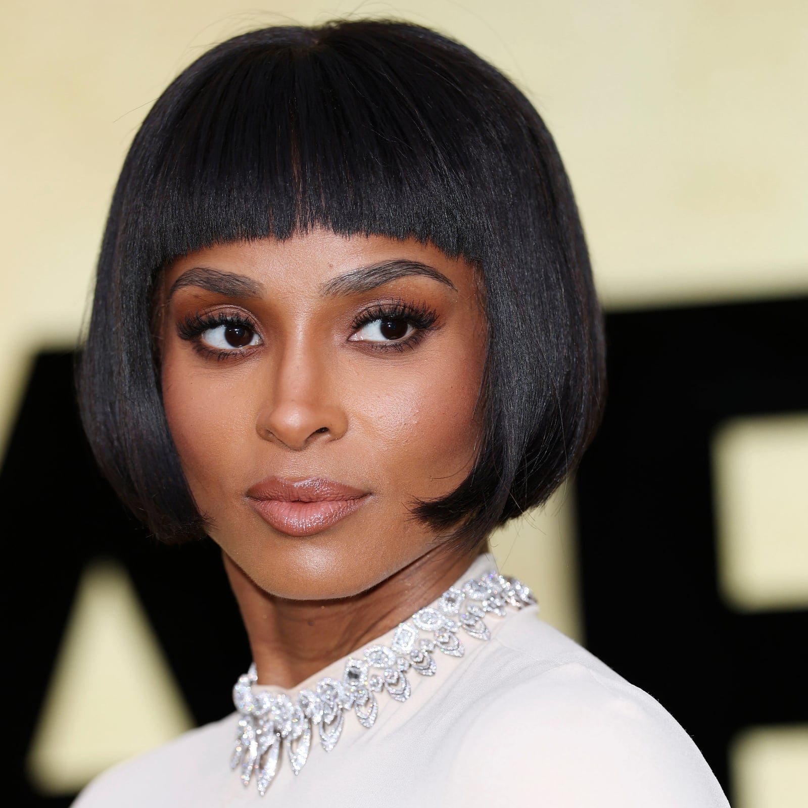 Chin Length Bob With Blunt Bangs Black — Simple Layer Bob