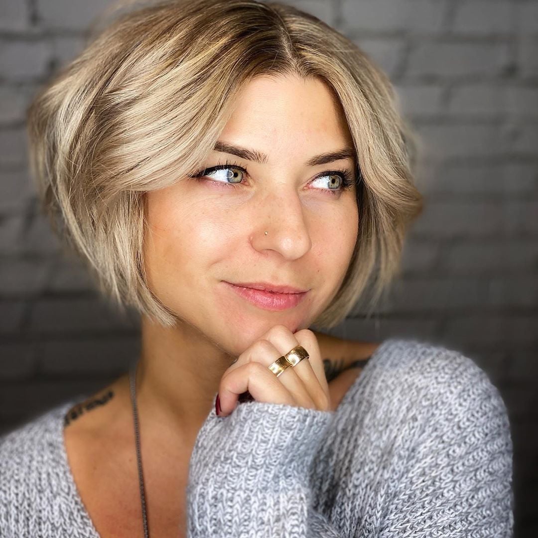 Chin Length Layered Bob With Curtain Bangs and Textured Waves Chin Length Layered Bob With Curtain Bangs and Textured Waves — Simple Layered Bob Hairstyles