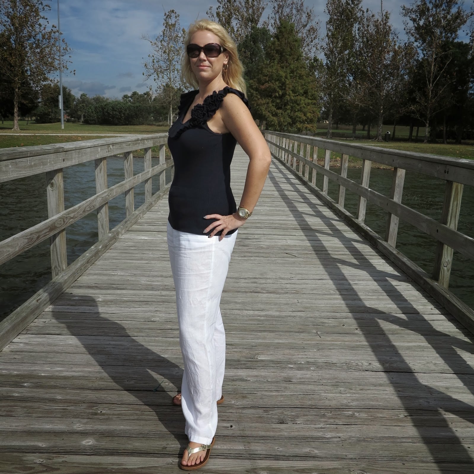 White Wide Leg Linen Pants with Ruffled Black Top, Close-Up Take — Simple Linen Pants Outfits