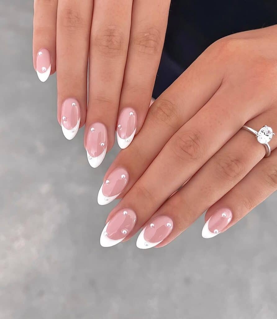 Sheer Pink French Tip Pearl Accent Medium Oval Nails Sheer Pink French Tip Pearl Accent Medium Oval Nails — Simple Luxury Nails