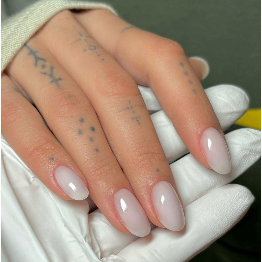 Sheer Milky Glossy Medium Almond Nails, Close-Up Take Sheer Milky Glossy Medium Almond Nails, Close-Up Take — Simple Milky White Nails