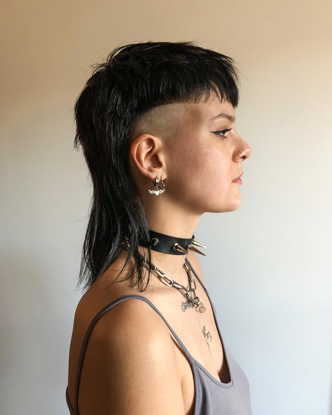 Black Mullet With Shaved Sides And Short Fringe — Simple Mullet Hairstyles