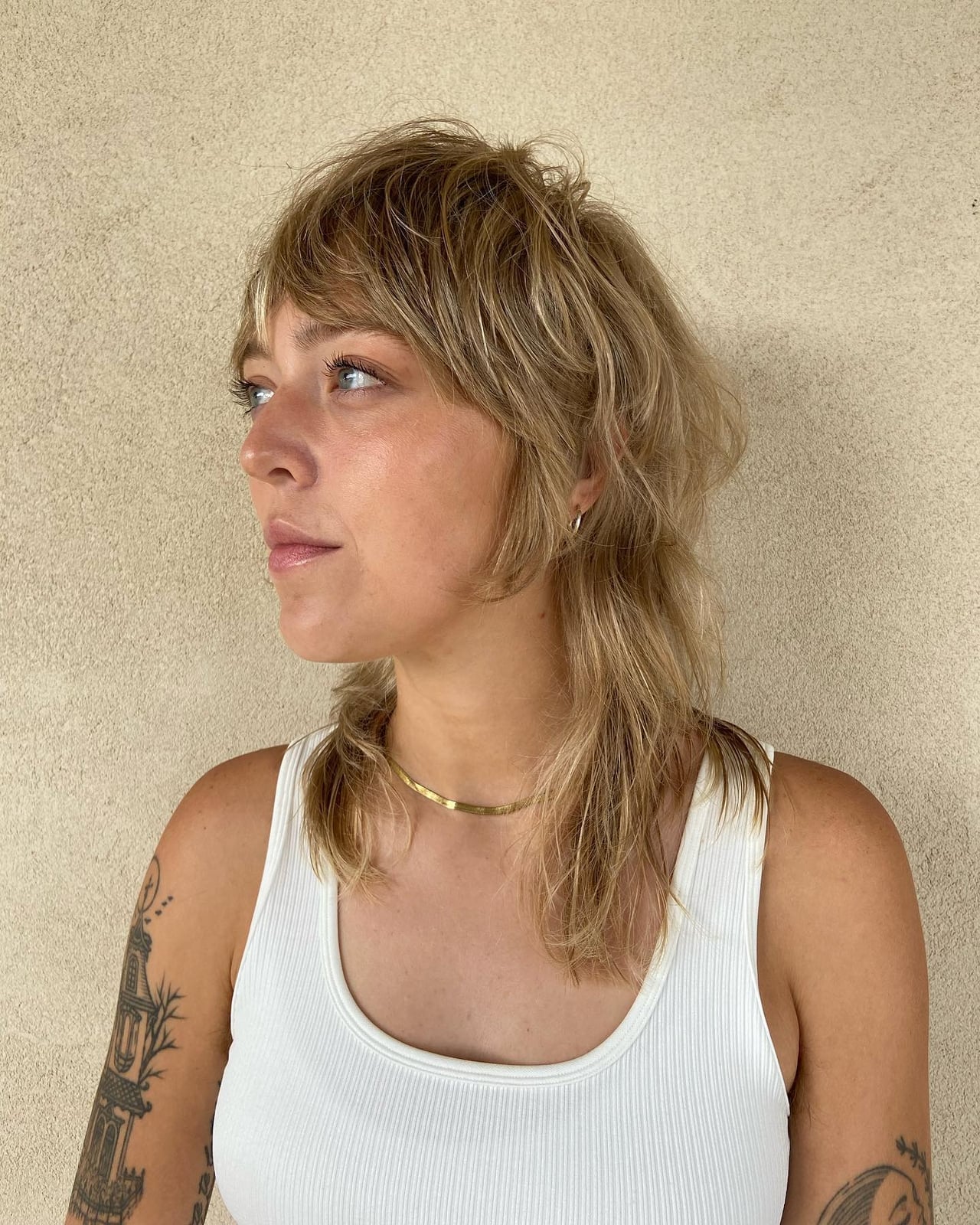 Fine Blonde Mullet With Face-Framing Curtain Bangs — Simple Mullet Hairstyles