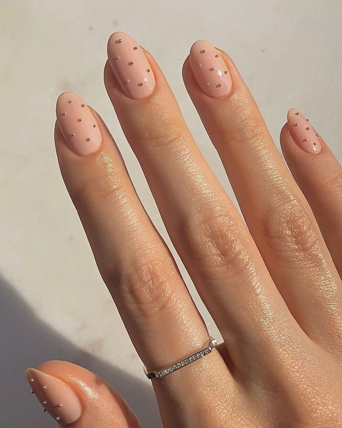 Medium Oval Light Beige Nude With Silver Studs — Simple Nude Nails
