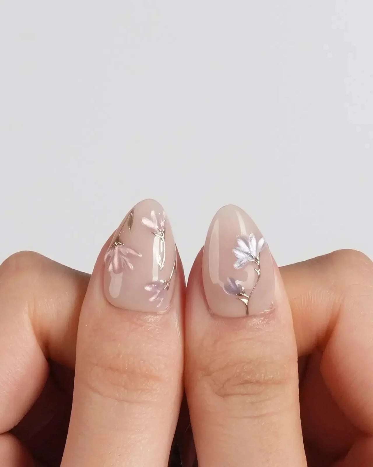Medium Almond Sheer Nude With Floral Designs — Simple Nude Nails