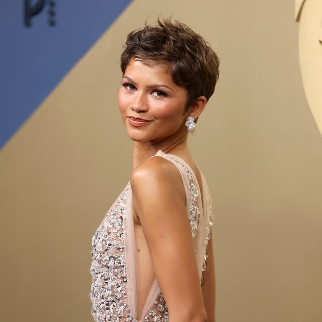 Chic Pixie With Swept Side Fringe — Simple Pixie Hairstyles