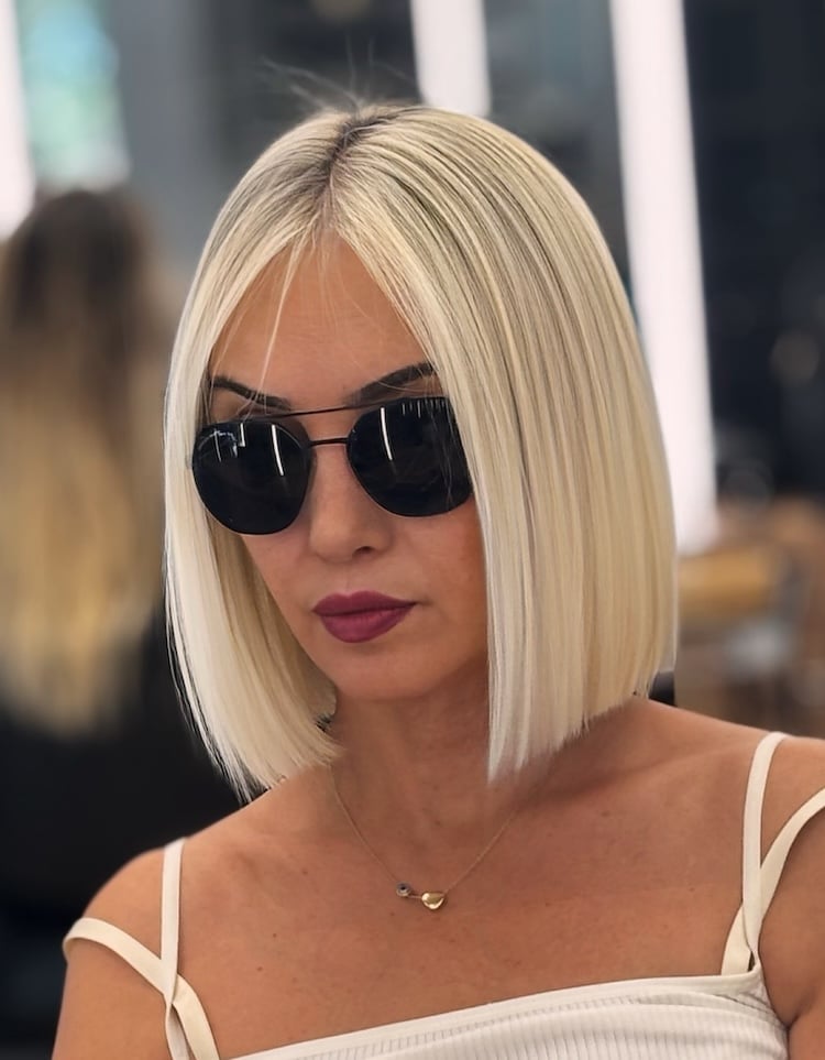 Sharp Platinum Blonde Blunt Bob At Chin Sharp Platinum Blonde Blunt Bob At Chin — Simple Platinum Blonde