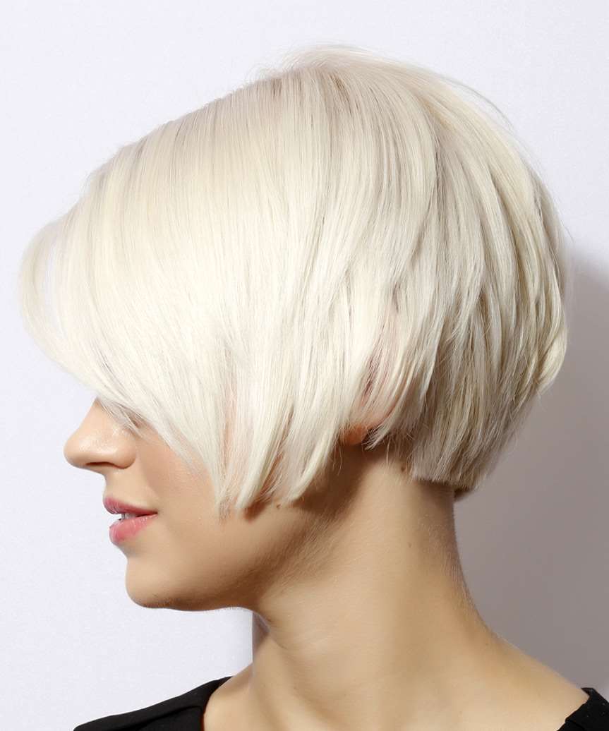 Fine Straight Bob With Side Swept Bangs and Showcasing A Sharp Fine Straight Bob With Side Swept Bangs and Showcasing A Sharp — Simple Platinum Blonde