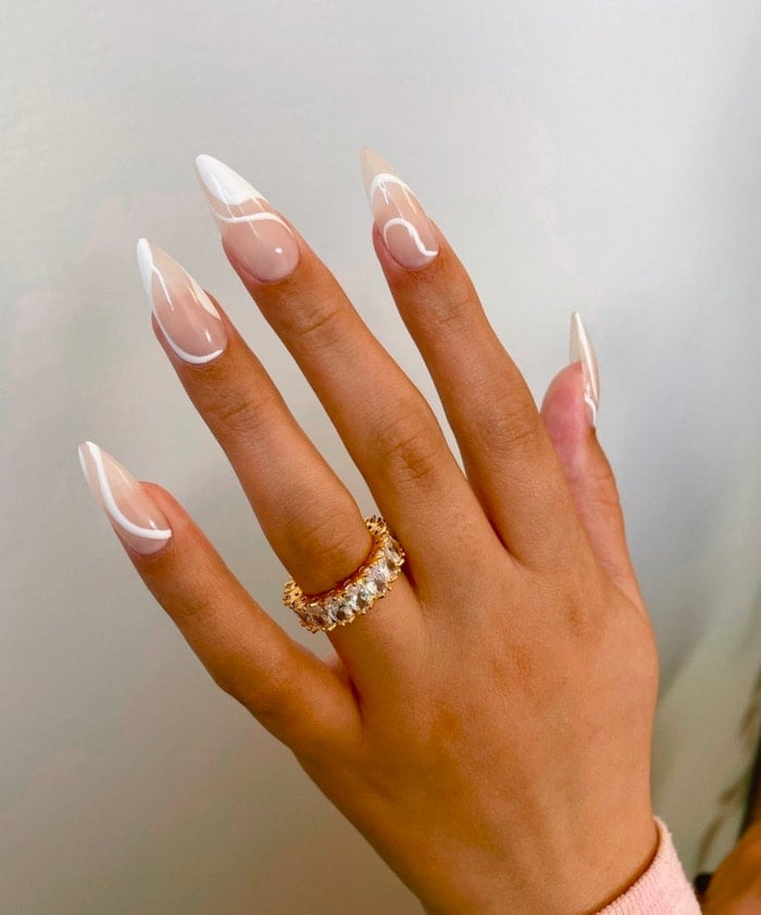 Sheer Nude Stiletto With White Fluid Lines — Simple Pointy Nails