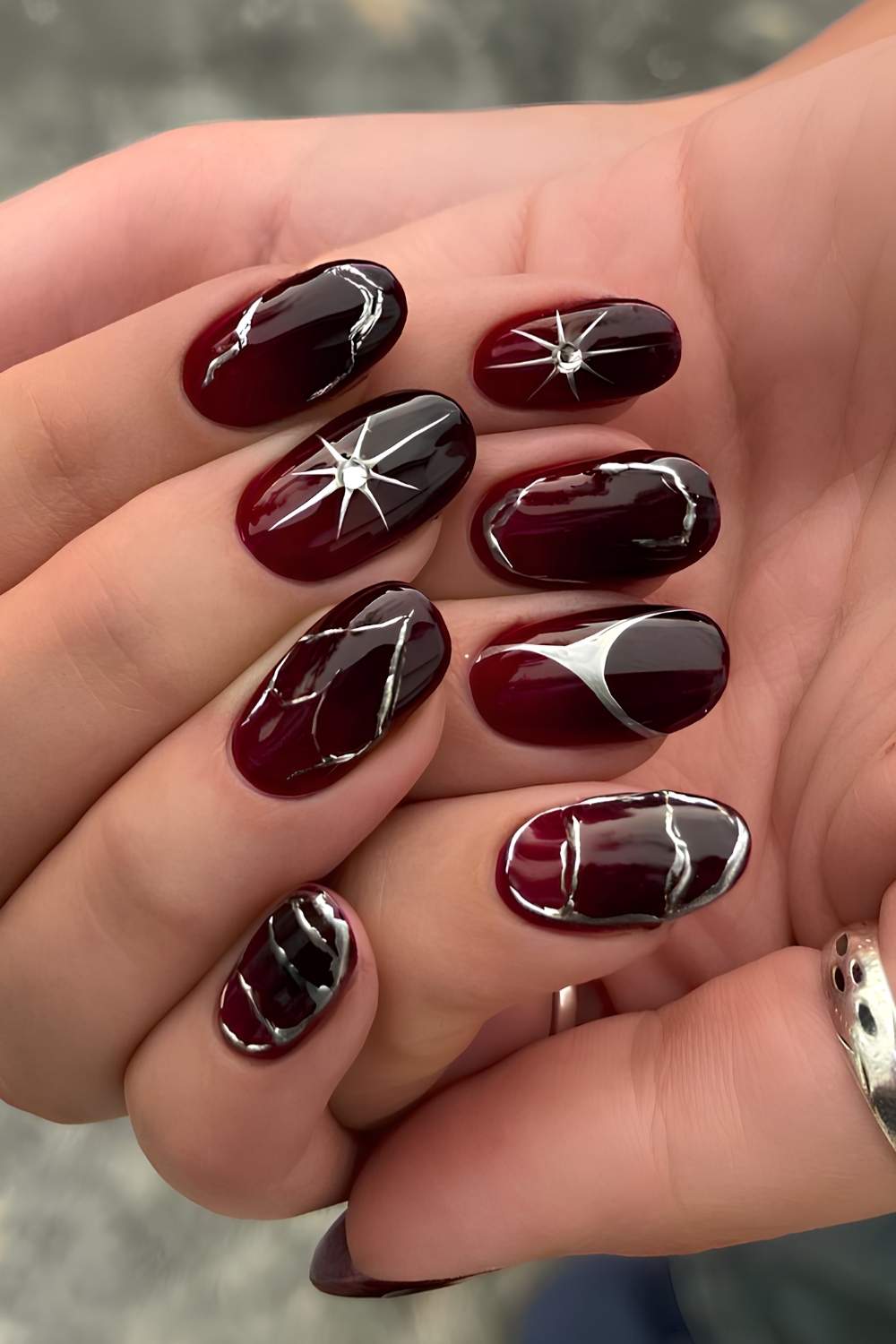 Short Oval Red Black Gradient With Silver Accents — Simple Red and Black Nails