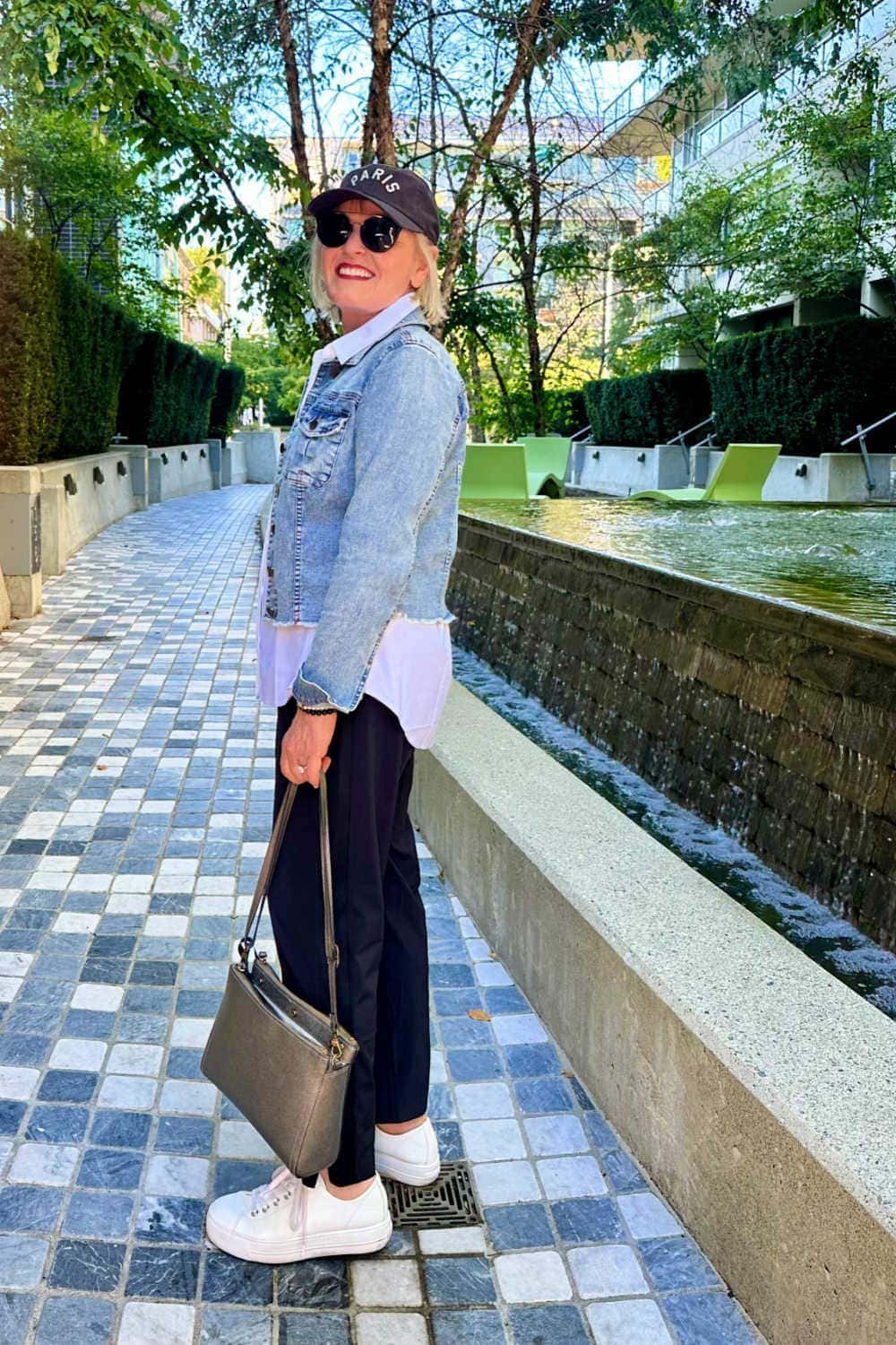 Denim Jacket Over White Shirt and Black Trousers — Simple Road Trip Outfits