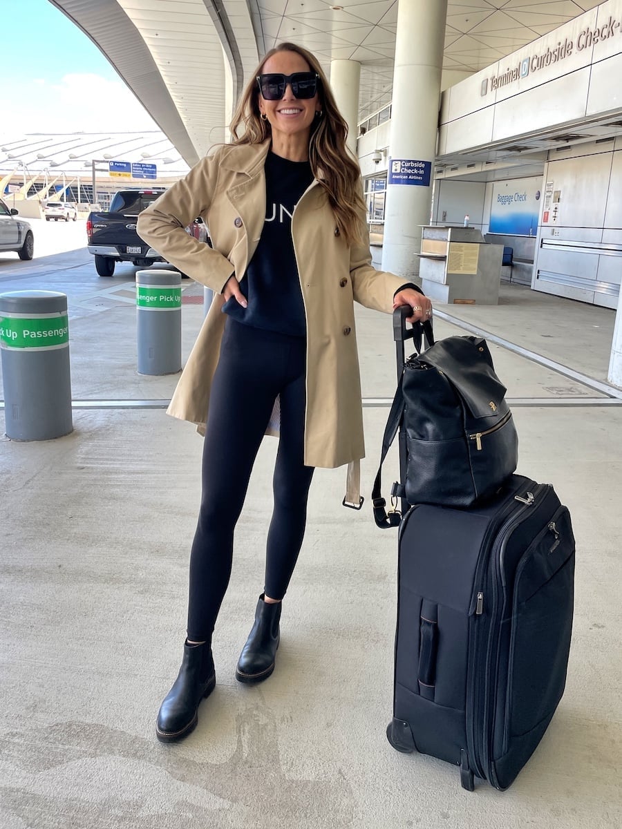 Beige Trench Coat Over Black Sweatshirt and Leggings — Simple Road Trip Outfits