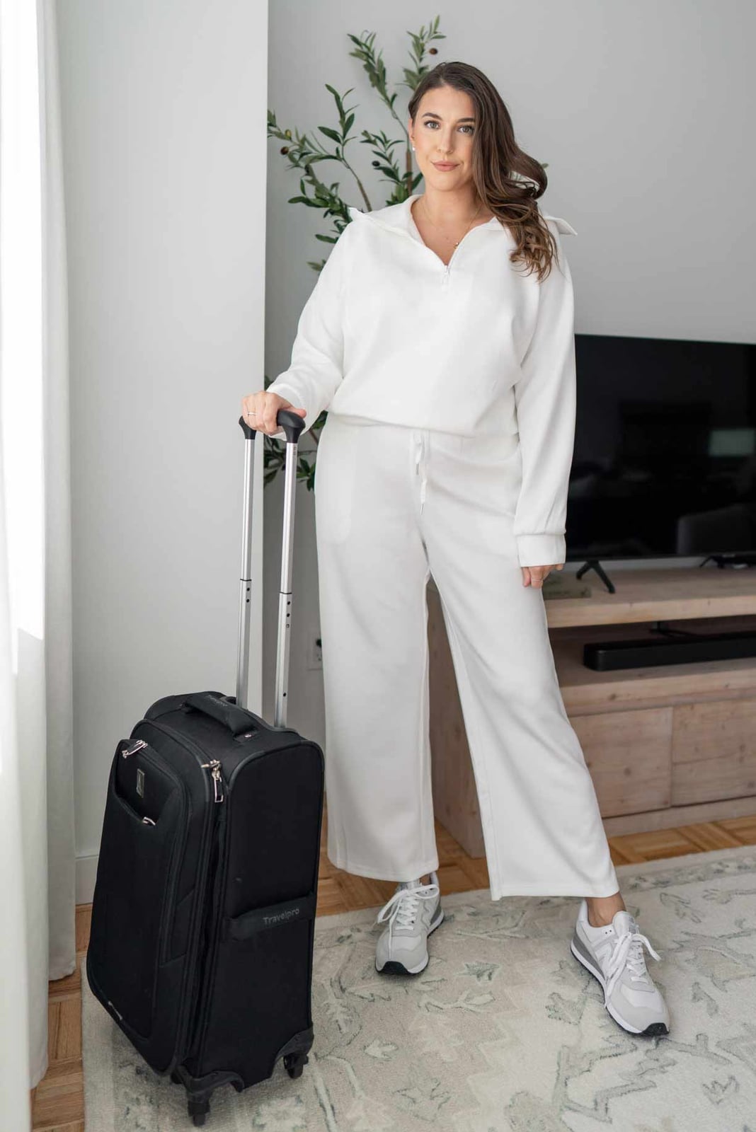 Oversized White Quarter-Zip Sweatshirt with White Sweatpants — Simple Road Trip Outfits
